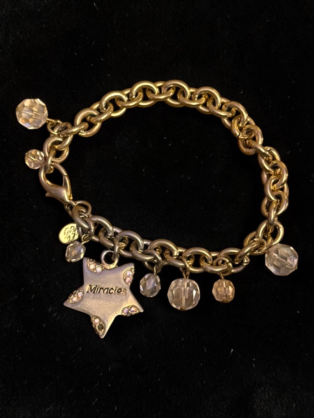 Vintage Kirks Folly gold tone Expect Miracles charm bracelet